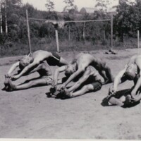 Group of athletes training for track and field events