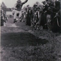 Athlete jumping in a broad jump competition